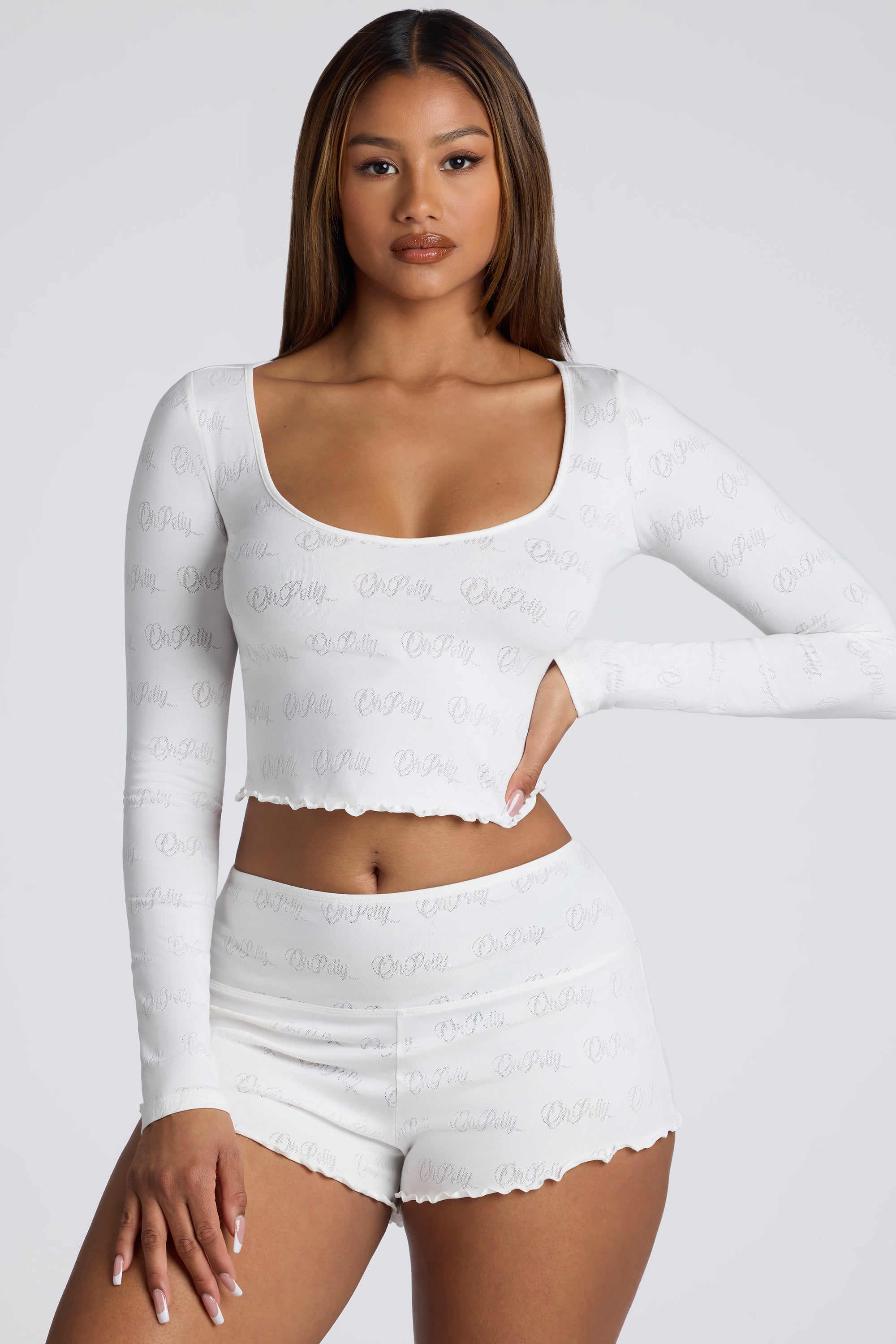 Mid Rise Pointelle Mini Shorts in White - 1