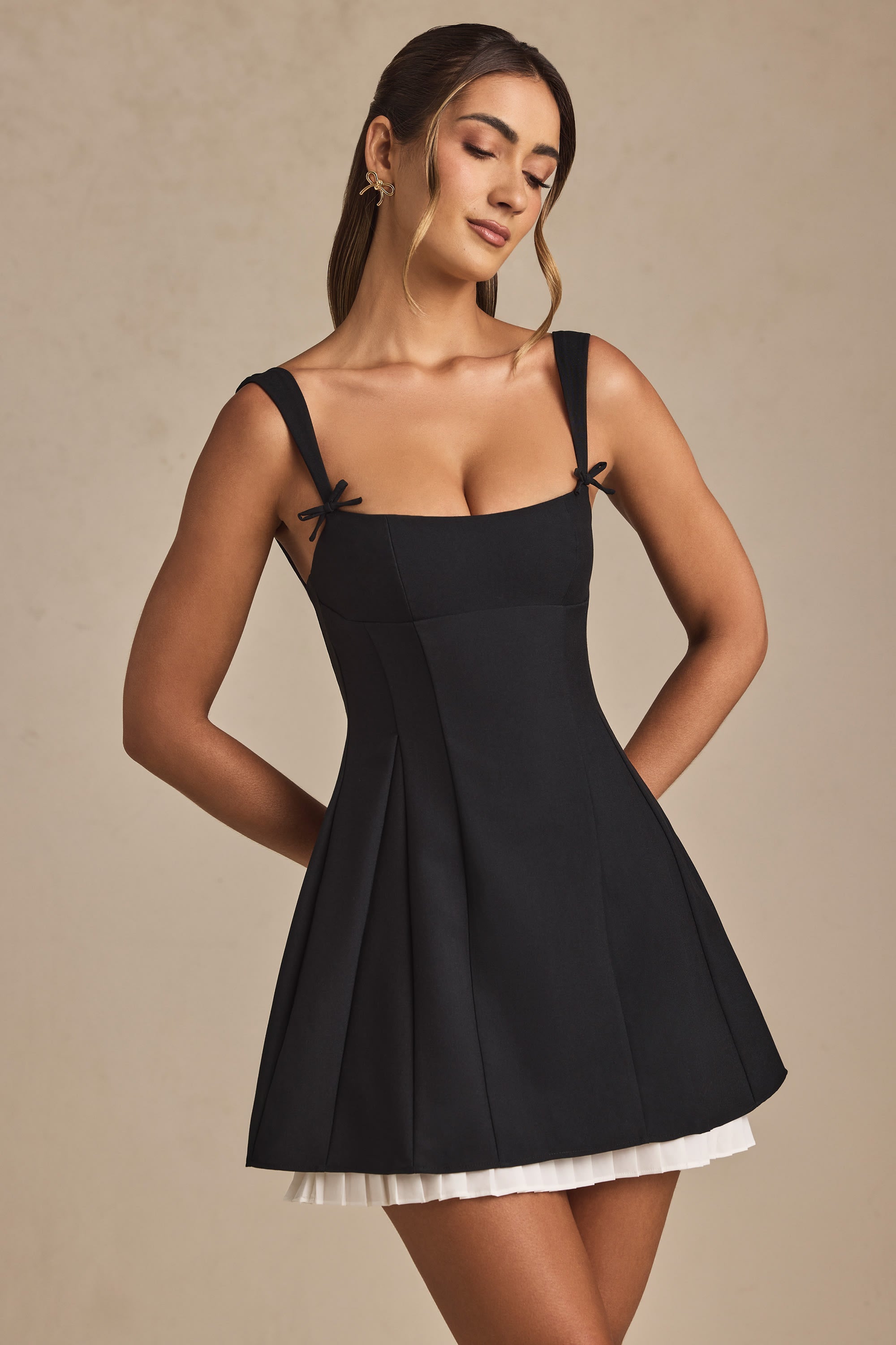 Bow-Detail Pleated A-Line Mini Dress in Black - 1